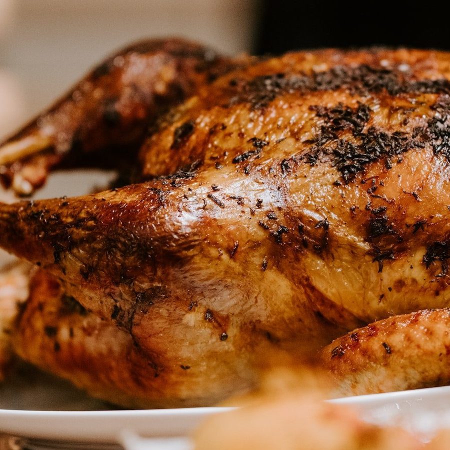 roasted chicken on white ceramic plate