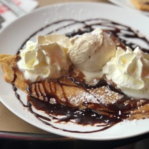 crepe with ice cream and syrup
